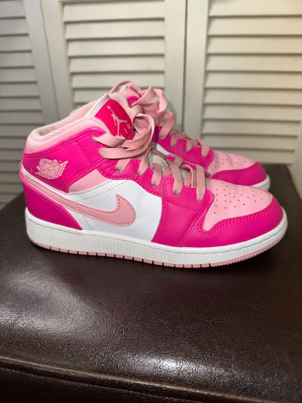 Kids Jordan 1 Mid (GS) “Fierce Pink” Sneakers…